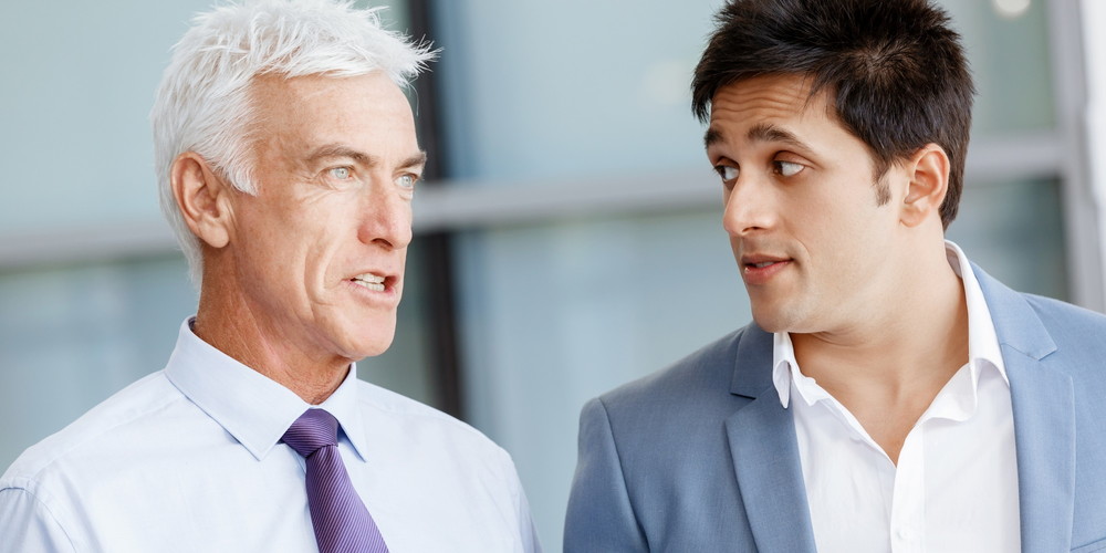 Two businessman in office having discussion